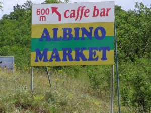 Sign for Albino market. [Croatia].